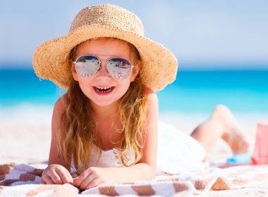 Girl smiling on the beach