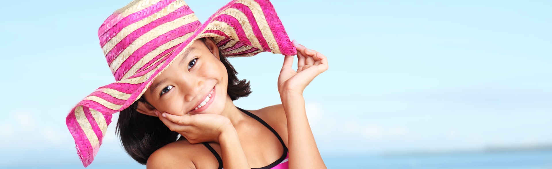 Girl with pink hat