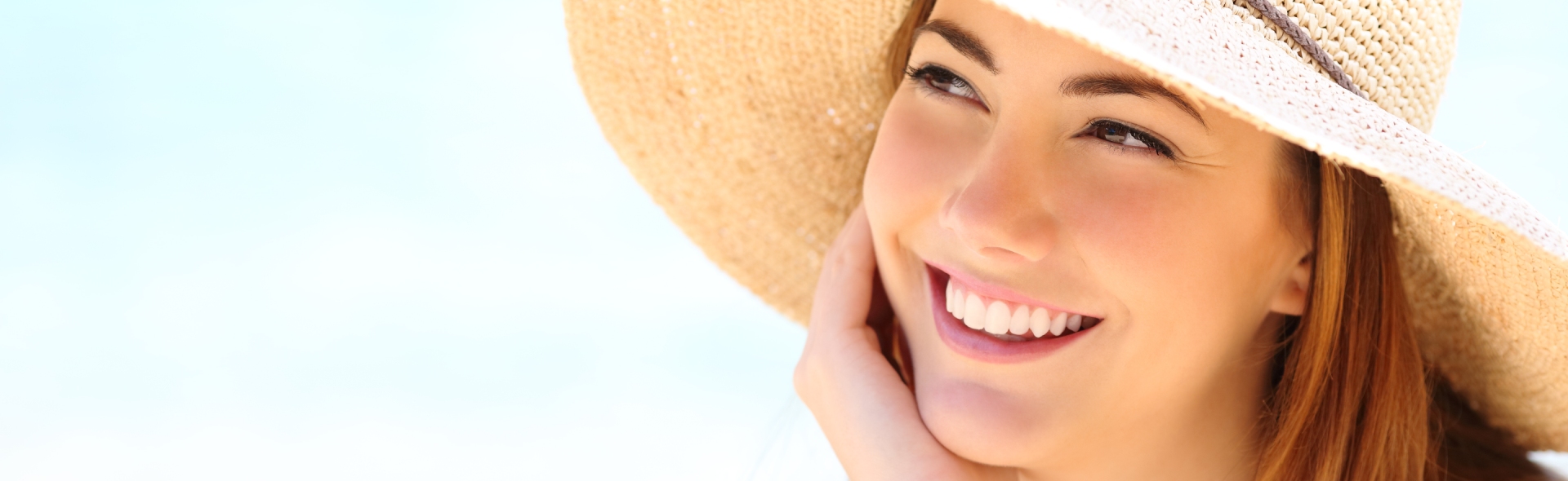 Teen in straw hat